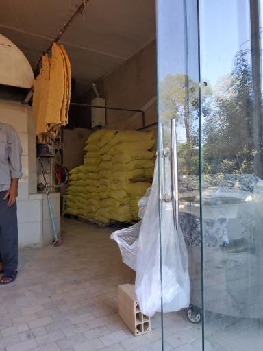 عکس نانوایی سنگکی ماشینی