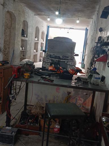 عکس باطری سازی و تنظیم موتور و کولر اتومبیل میلاد فاریابی