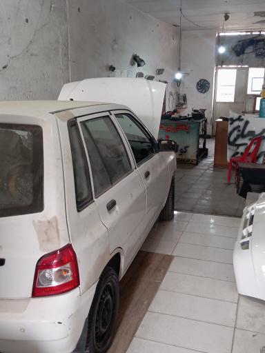 عکس باطری سازی و تنظیم موتور و کولر اتومبیل میلاد فاریابی