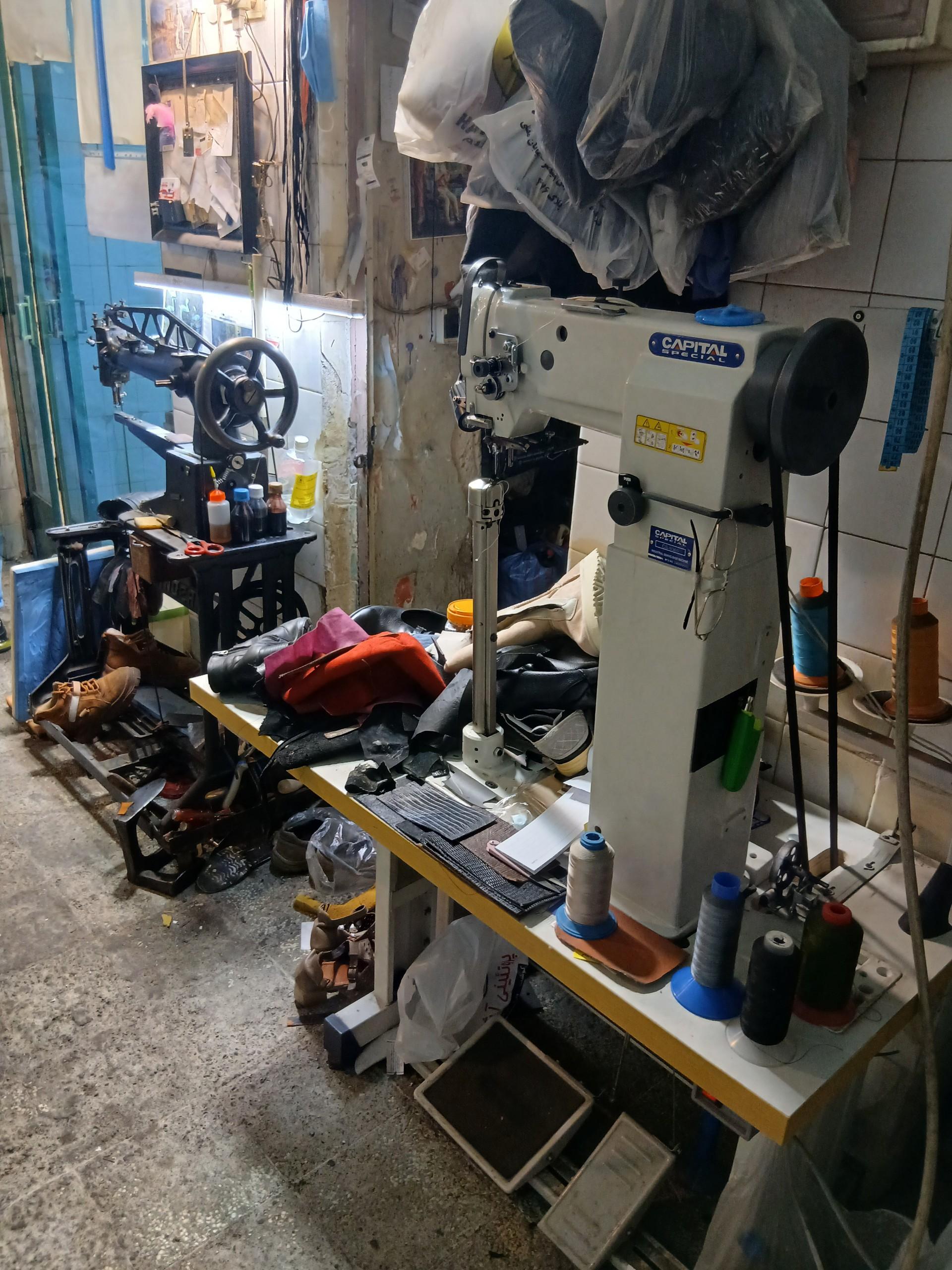 عکس تعمیرات تخصصی کیف و کفش ابشار