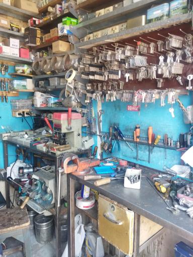 عکس قفل و کلیدسازی شیشه بالابر اسماعیلی