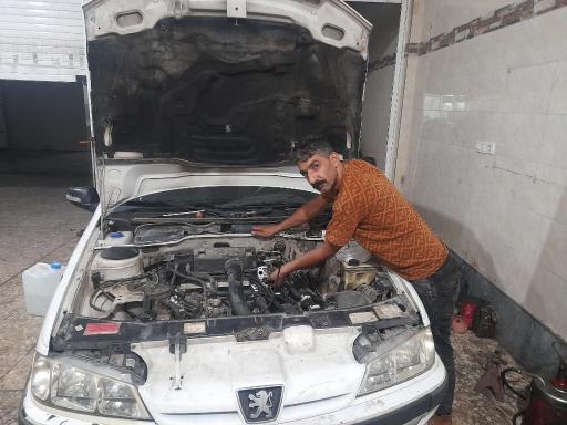 عکس تعمیرگاه شبانه روزی استارت