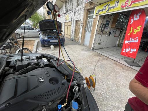 عکس تعمیرگاه تنظیم‌ موتور و برق و باطری