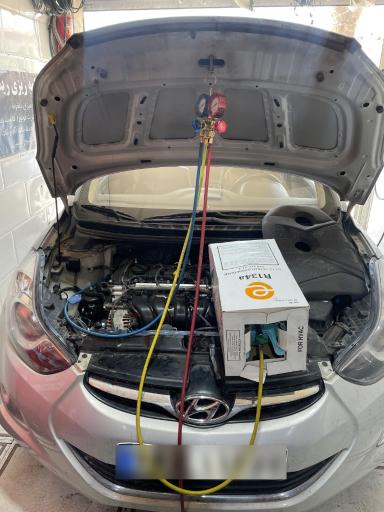 عکس تعمیرگاه تنظیم‌ موتور و برق و باطری