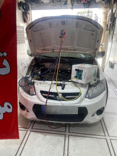 عکس تعمیرگاه تنظیم‌ موتور و برق و باطری