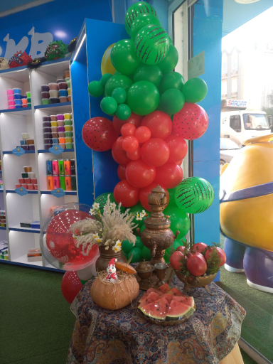 عکس فروشگاه رنگین کمان