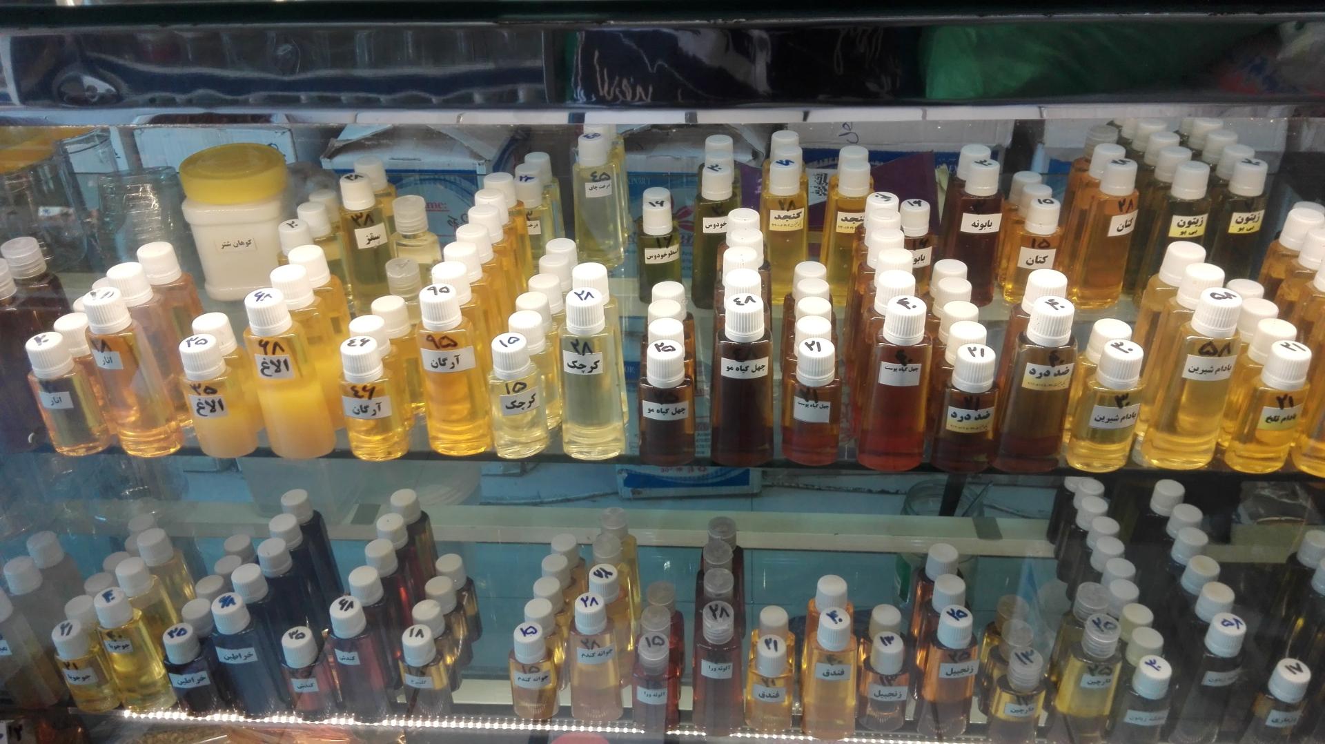 عکس روغن گیری کنجد و بادام زمینی