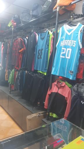 عکس فروشگاه و کالای ورزشی المپیک