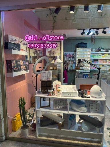 عکس فروشگاه لوازم کاشت ناخن تی تی استور