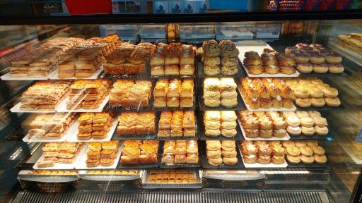 عکس شیرینی فروشی نورا