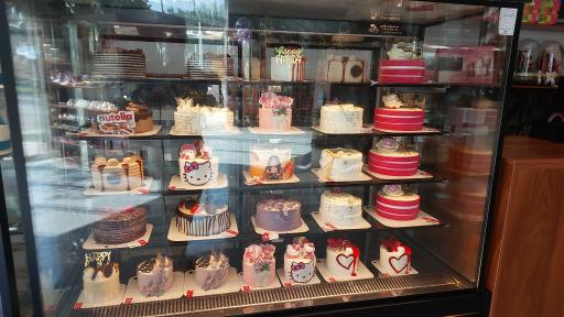 عکس شیرینی فروشی نورا