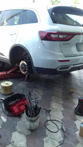 عکس تعمیرگاه و تعویض لنت ترمز محمد