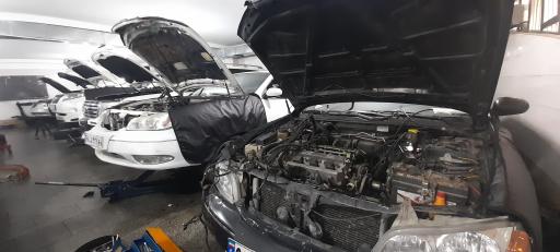 عکس کلینیک خودرو عزیزی