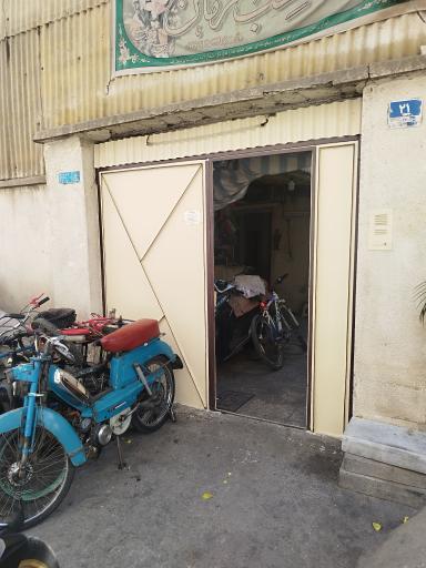 عکس تعمیر دوچرخه و موتور سید