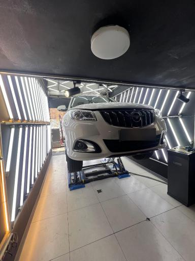 عکس کارشناسی رنگ و فنی خودرو سپهر