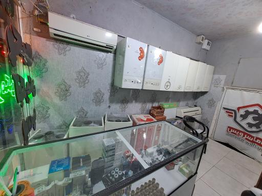 عکس تعمیرگاه با ما سرویس