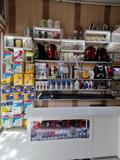 عکس تعمیرگاه لوازم خانگی موفّـق 