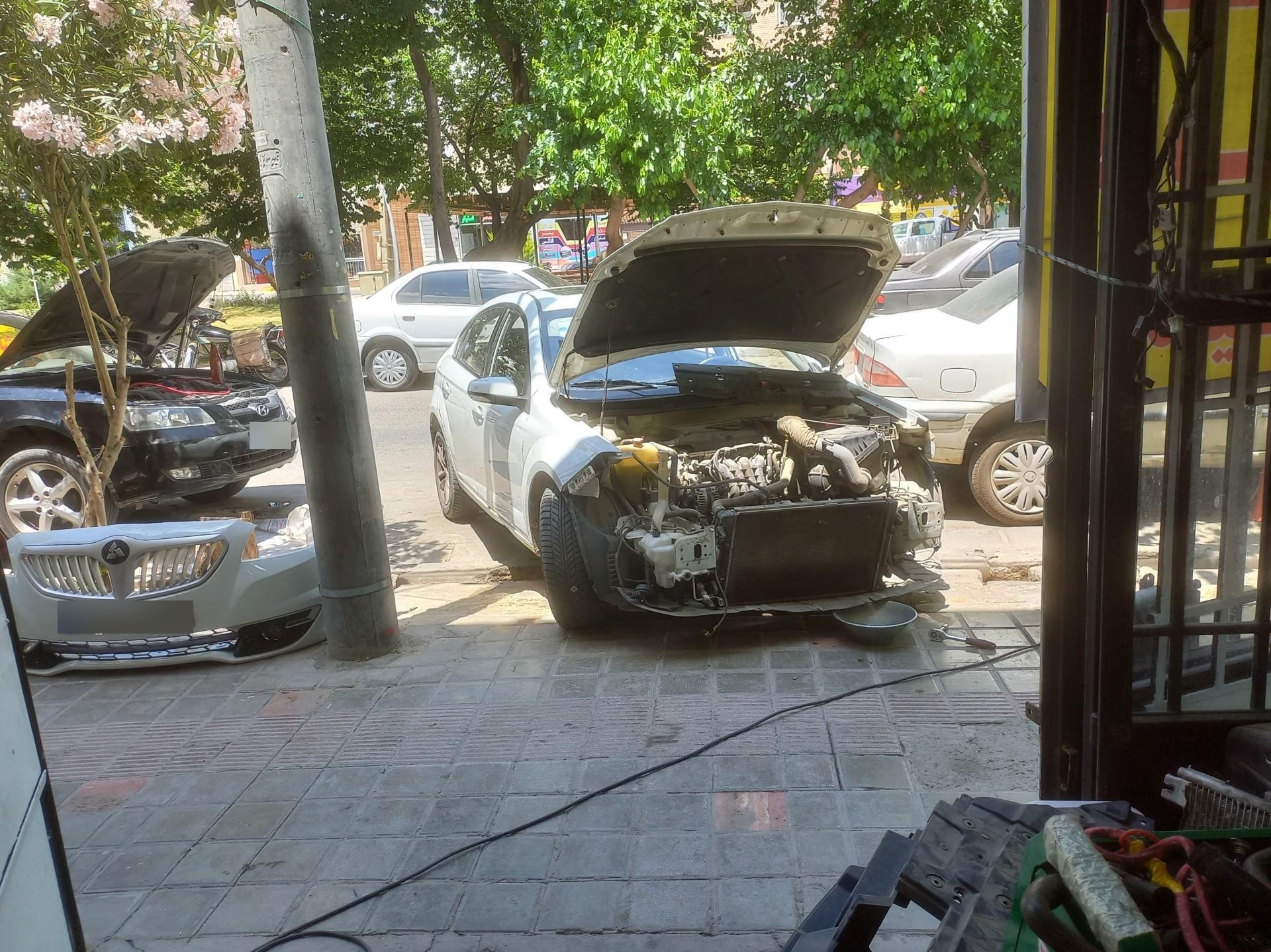 عکس خدمات برق و کولر اتومبیل محمد