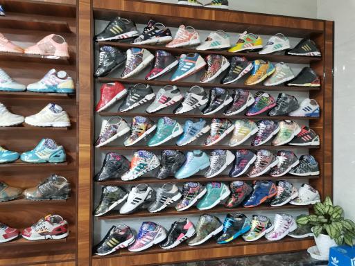 عکس فروشگاه آدیداس مولی