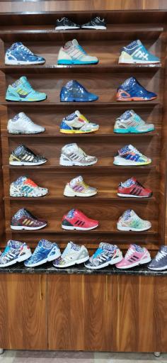 عکس فروشگاه آدیداس مولی