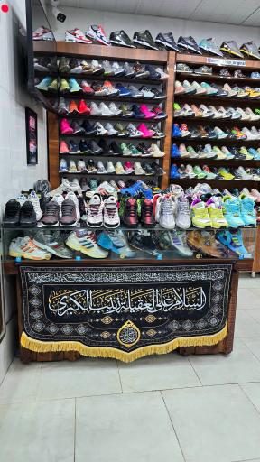 عکس فروشگاه آدیداس مولی
