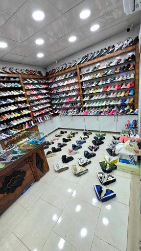 عکس فروشگاه آدیداس مولی