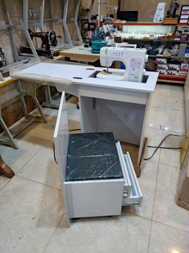 عکس نمایندگی فروش و تعمیر چرخ‌های خیاطی