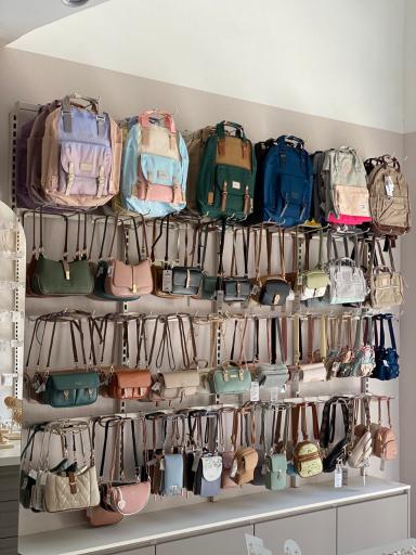 عکس فروشگاه اکسسوری و کیف و زیورآلات ملوژیک