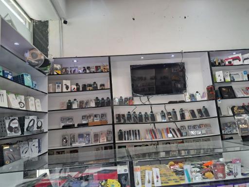 عکس فروشگاه محصولات فرهنگی و گیم نت پاسارگاد