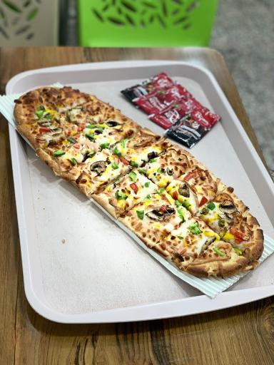 عکس پیتزا ساندویچ آداک