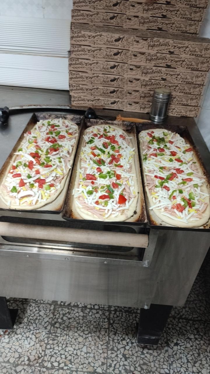 عکس پیتزا ساندویچ آداک