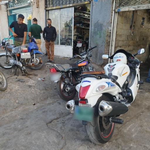 عکس تعمیرات موتورسیکلت کافیان