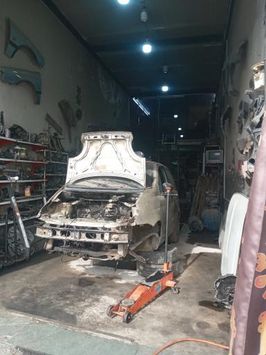 عکس دفتر استوک اسقاط پارکینگ قائم عج