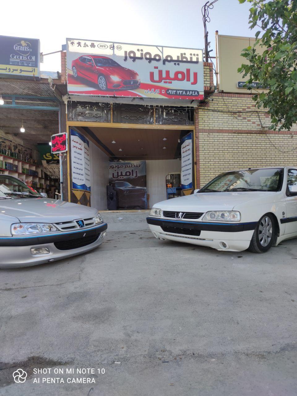 عکس تنظیم موتور و تعمیرات ایسیو رامین کارگران 