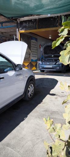 عکس تنظیم موتور و تعمیرات ایسیو رامین کارگران 