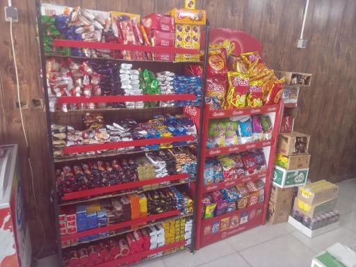 عکس فروشگاه مواد غذایی عزیزی