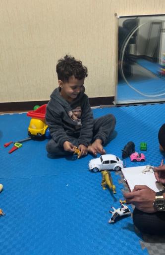 عکس گفتاردرمانی و کاردرمانی توانیاب