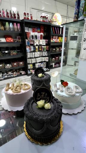 عکس شیرینی سرای تاج گاندی