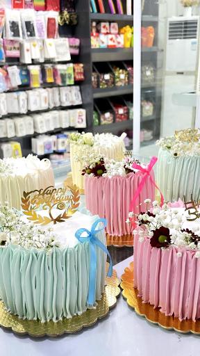 عکس شیرینی سرای تاج گاندی