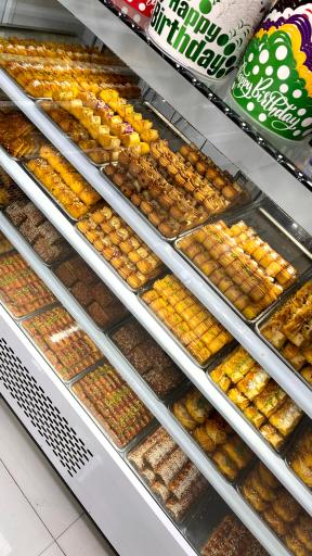 عکس شیرینی سرای تاج گاندی