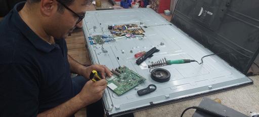 عکس تعمیرات تلویزیون کیانشهر اهواز