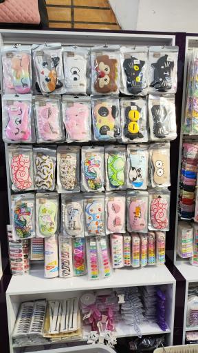 عکس مرکز پخش بدلیجات و کش و کلیپس شریفیان 