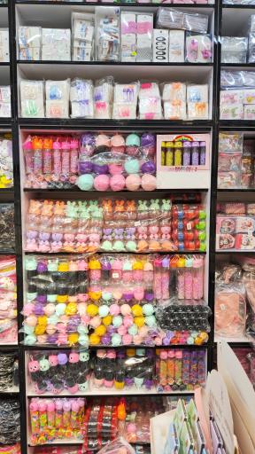 عکس مرکز پخش بدلیجات و کش و کلیپس شریفیان 