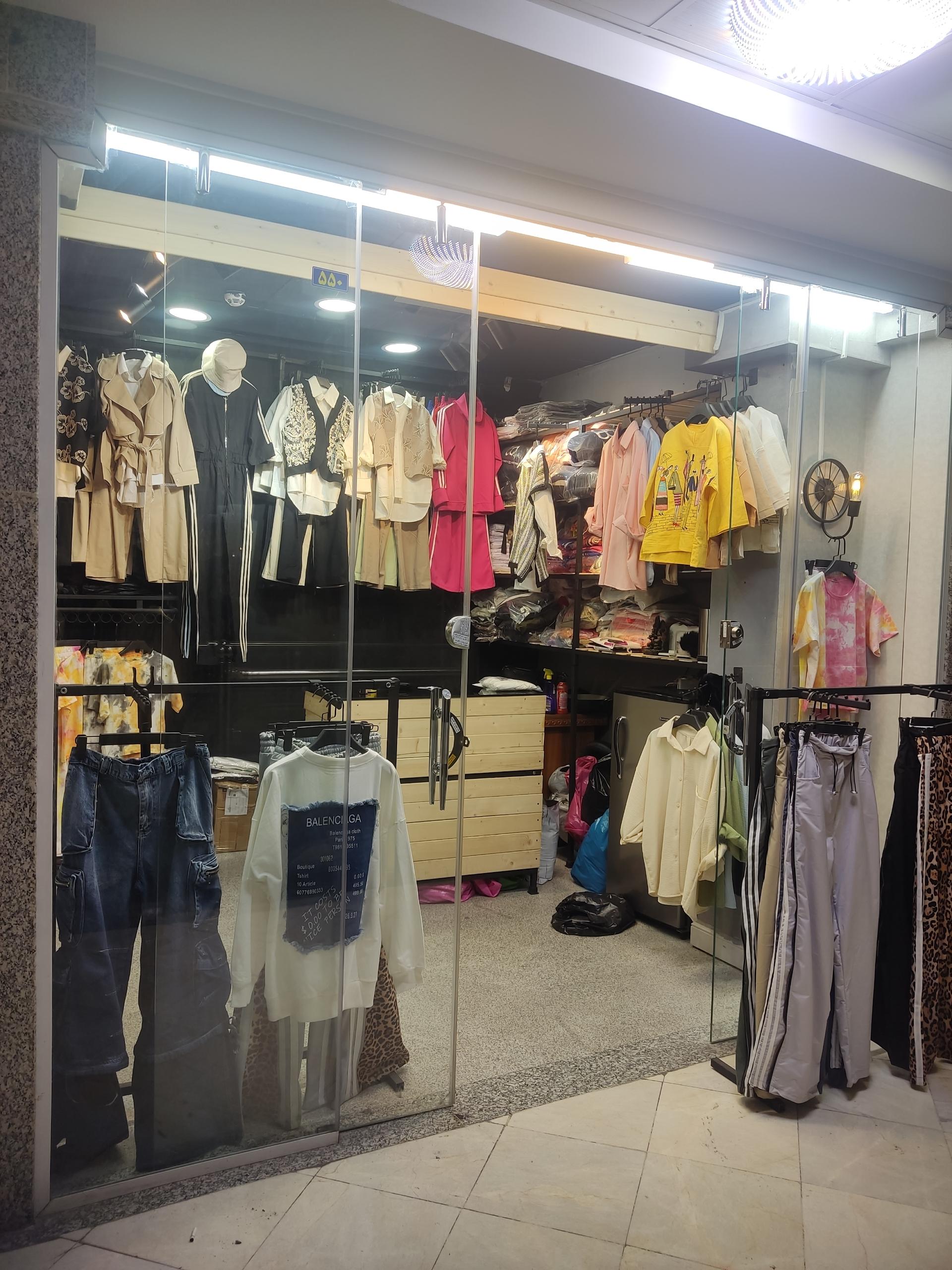 عکس تولید و پخش پوشاک دلا و آلان