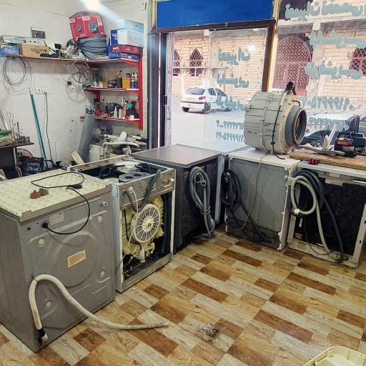 عکس تعمیرات لباسشویی همراز