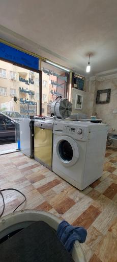عکس تعمیرات لباسشویی همراز