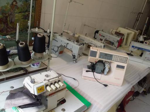 عکس تعمیر چرخ خیاطی رضا