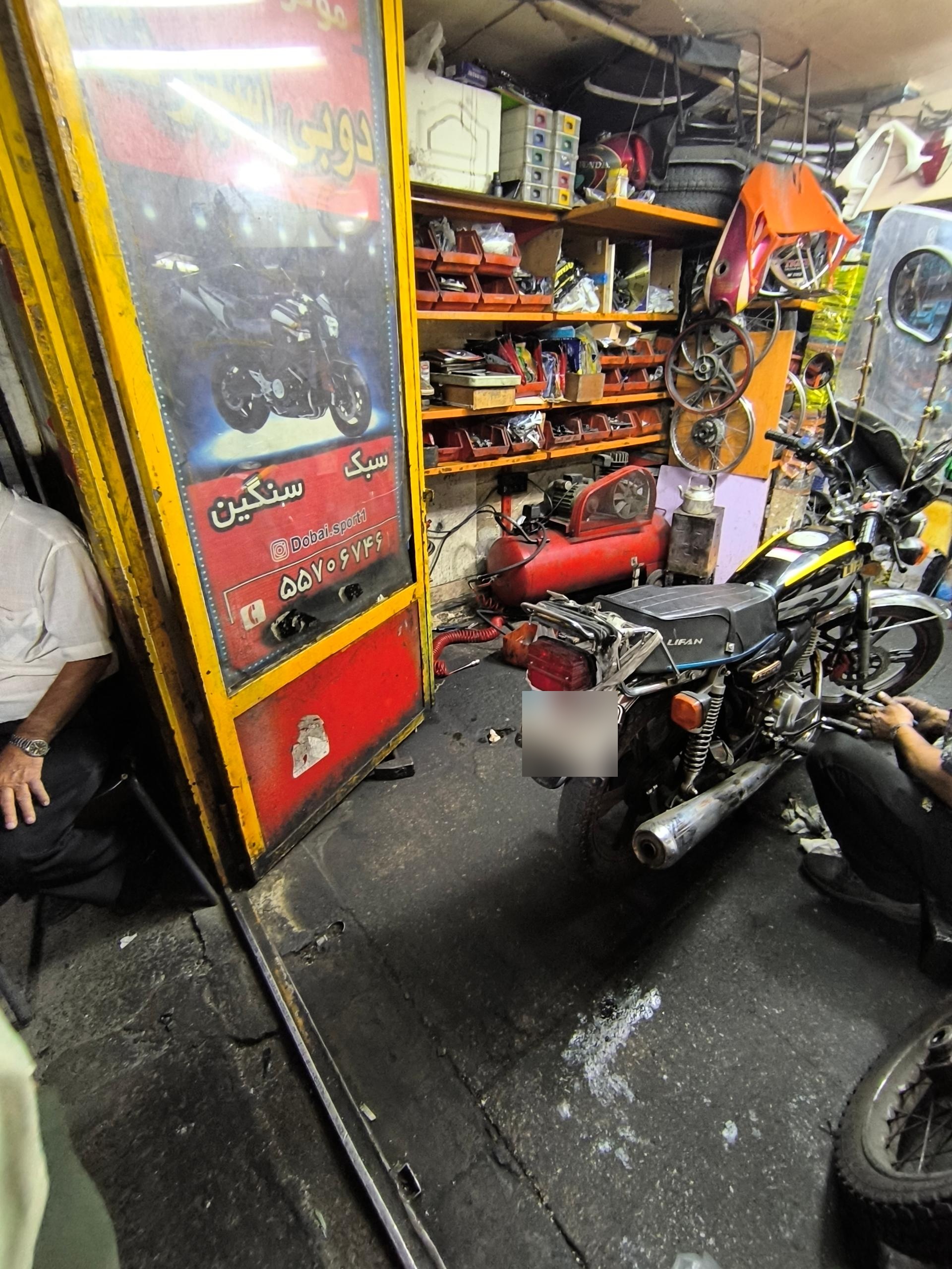 عکس تعمیرگاه موتور سیکلت 