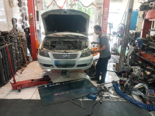 عکس تعمیرگاه و لنت‌کوبی متالیک بخشایش