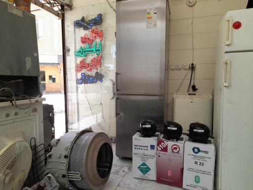 عکس تعمیرات یخچال و فریزر ساید